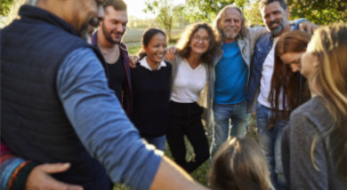 Family members embracing outdoors