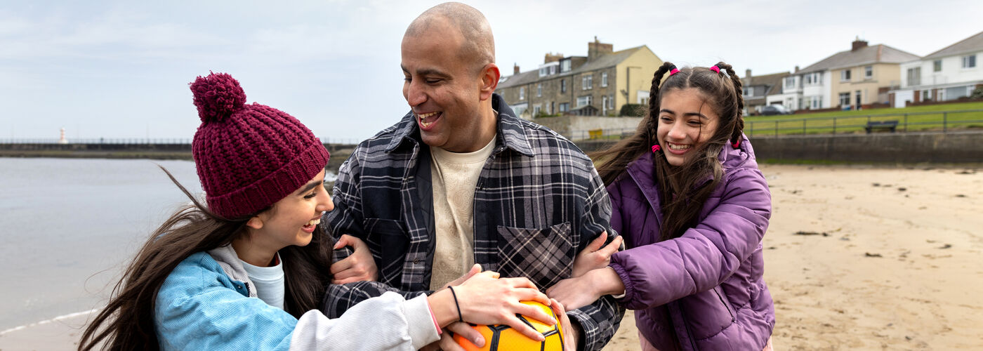 Happy family on a beach 