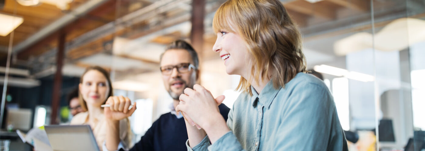 Women sat having a discussion 