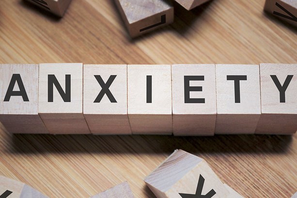 Anxiety word written wooden cubes