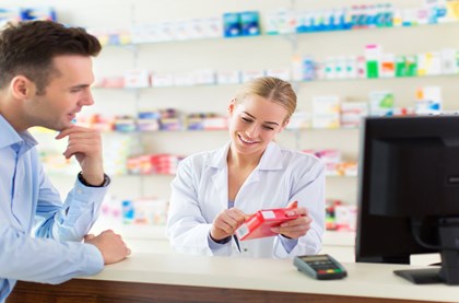 Pharmacist advising patient