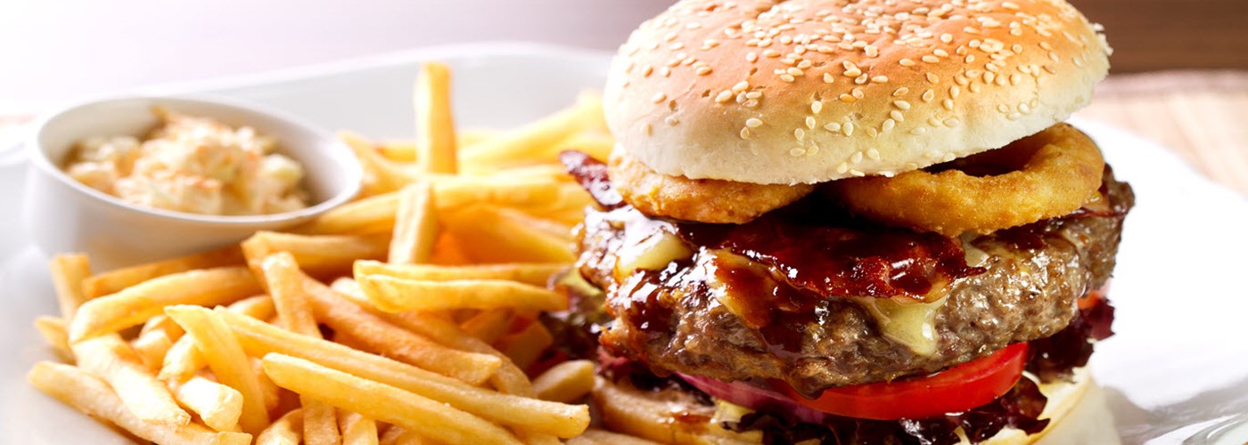 hamburger-sandwich-with-french-fries-and-sauce-on-side