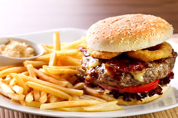 hamburger-sandwich-with-french-fries-and-sauce-on-side