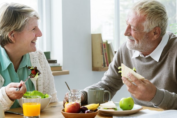 older couple eating healthy food