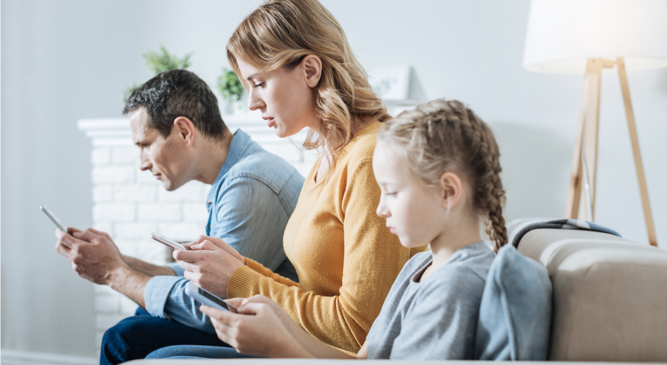 Family all on their phones
