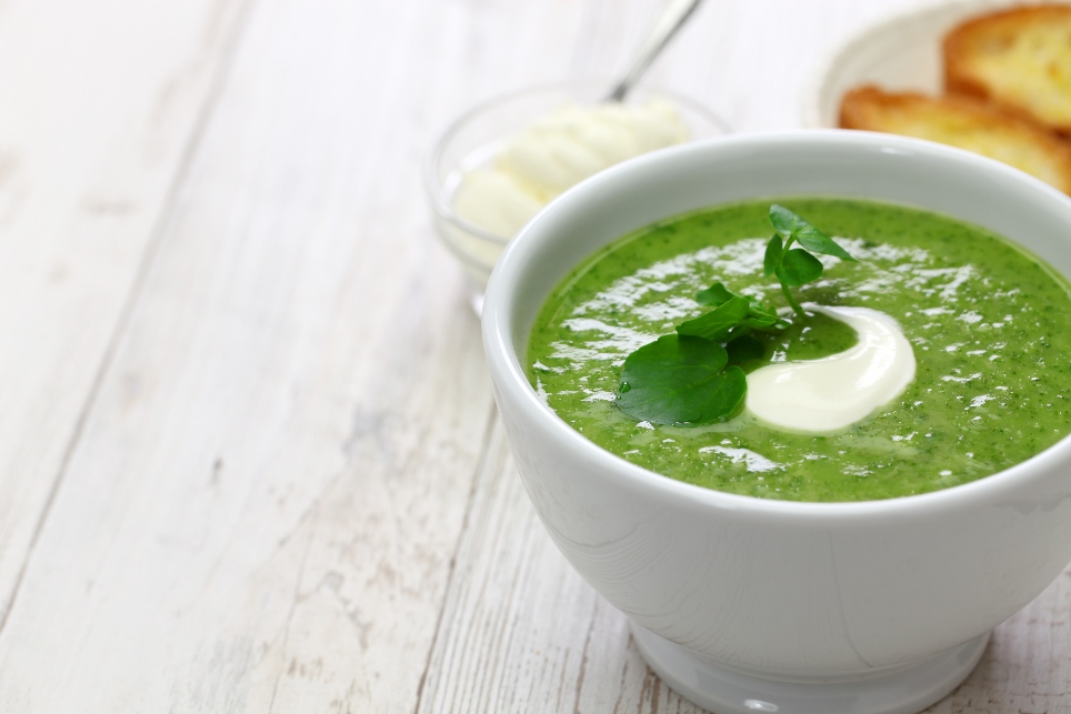 Nourishing super green soup in a bowl