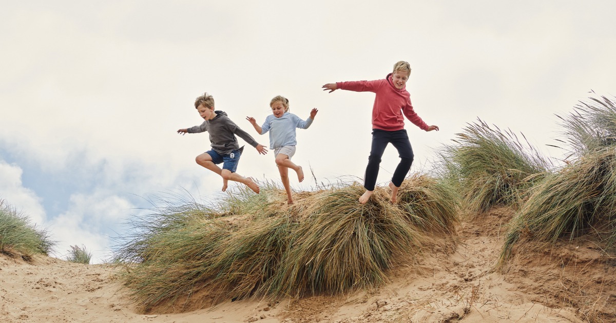 Family enjoying their time on the beach
