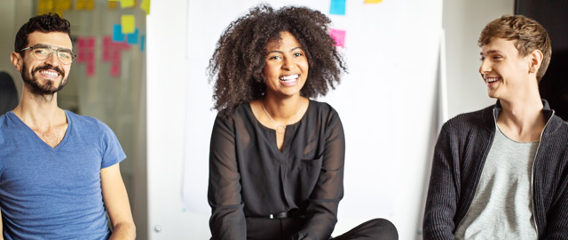 Three colleagues in a meeting