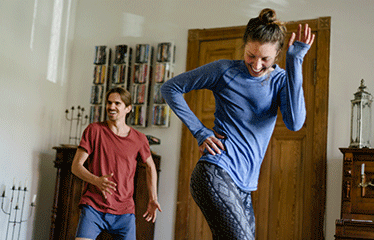 Women and man exercising 