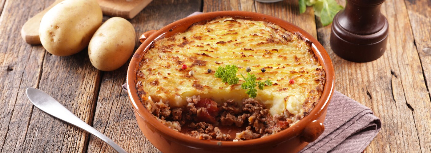 Home-made Shepherd's pie on a wooden table
