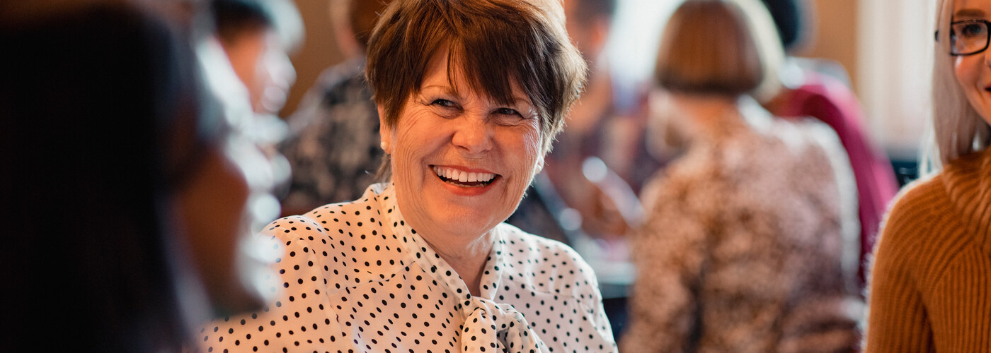 Mature Woman Enjoying Book Club