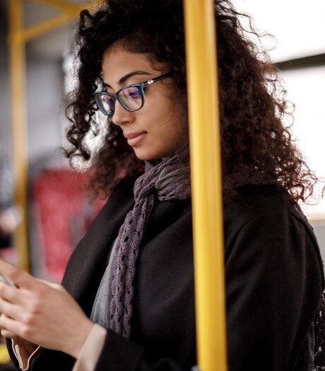 Young woman traveling by bus