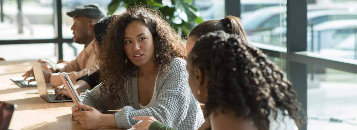 Women sat having a discussion 