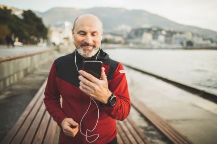 man exercising and using mobile phone