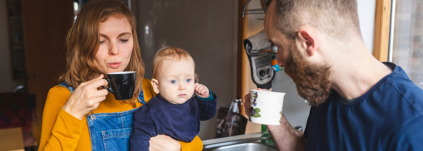 New mum dad catching up over a coffee
