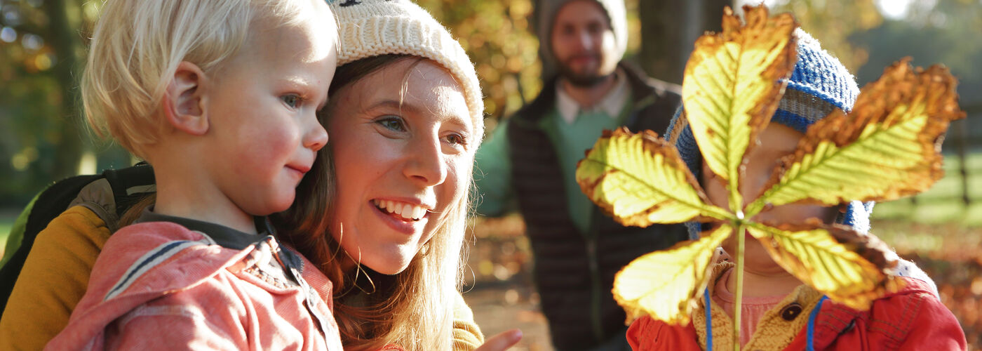 Young family on an autumn walk
