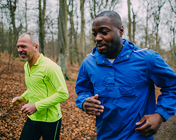 Two men running outdoors