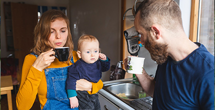Young parents having a mug of tea